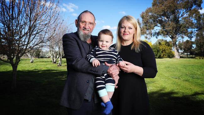 Dr Gregory Smith - with partner, Catherine Player, and their baby William - treasures each day of ‘this stunning new chapter of my life’. Picture: John Feder/The Australian