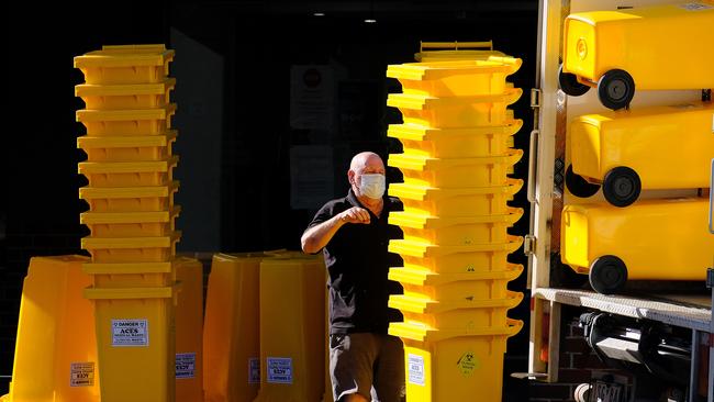 Bins being unloaded at Arcare Maidstone aged care facility for a deep clean. Picture: NCA NewsWire/Luis Ascui