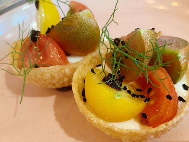 Heirloom tomatoes, whipped tofu, in pani puri crisp at Sparkke at the Whitmore. Picture: Dianne Mattsson