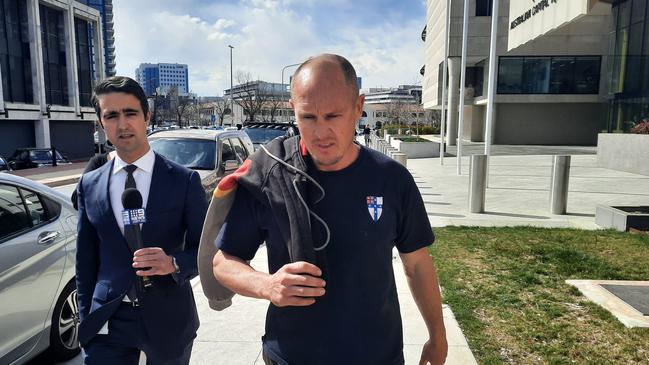 Owen Van Duren, 39, leaves the ACT Magistrates Court after being charged with possessing four stolen piglets. He is expected to face further charges. Picture: Craig Dunlop