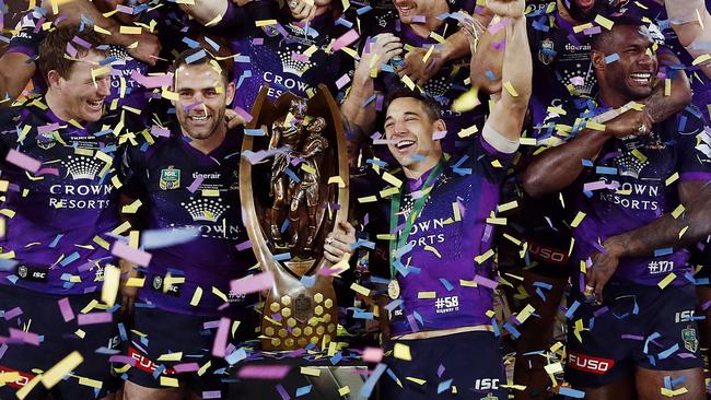 The victorious Melbourne Storm team captained by Cameron Smith celebrate defeating the North Queensland Cowboys in the 2017 NRL Grand Final at ANZ Stadium, Sydney. Picture. Brett Costello