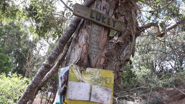 The latest incident on Burnside Rd at Ormeau occurred next to a tribute to Luke Brehmer, a 45-year-old Gilberton motorcyclist who was found dead at the location after a crash in January, 2014. Picture: Jason O'Brien