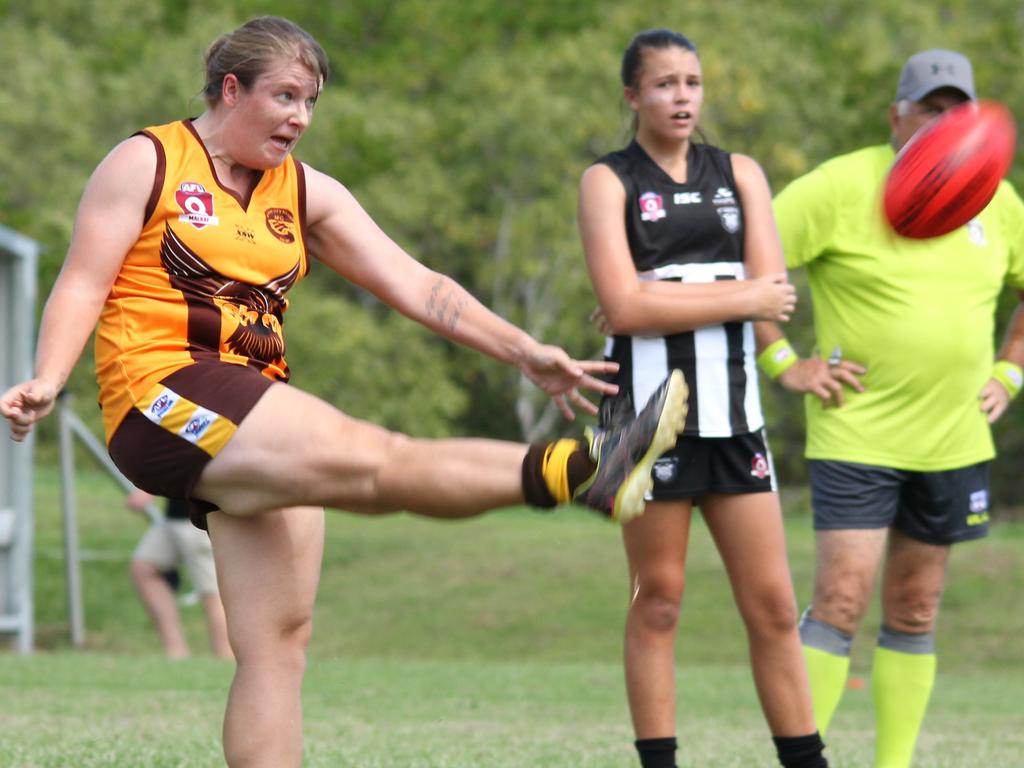 Jen Revell playing for the Mackay City, she became a premiership captain with the Hawks in 2022.