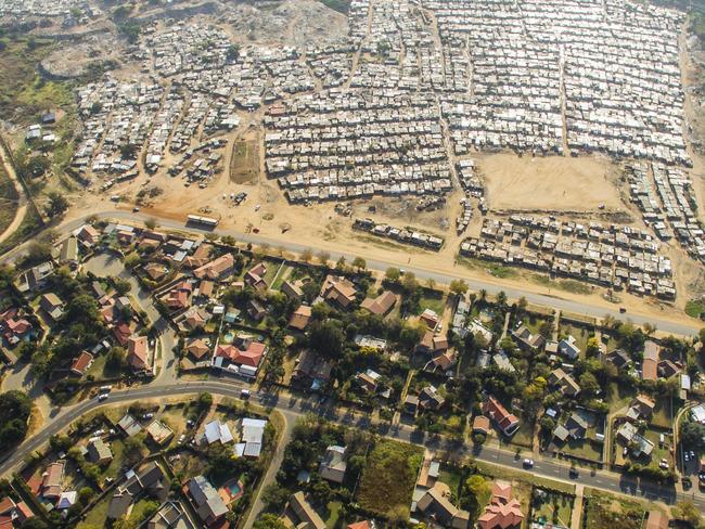 Unequal Scenes: Segregation of urban spaces in South Africa. Picture: Johnny Miller/Millefoto/Rex Shutterstock/Australscope