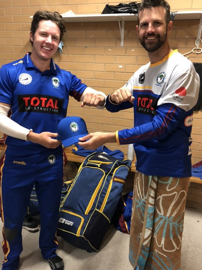 Northern Districts cricketer Axel Cahlin being congratulated by captain Ben Davis. Pic: Supplied