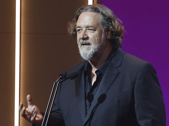 GOLD COAST, AUSTRALIA - FEBRUARY 07: Host Russell Crowe speaks during the 2025 AACTA Awards Presented By Foxtel Group at HOTA (Home of the Arts) on February 07, 2025 in Gold Coast, Australia. (Photo by Mackenzie Sweetnam/Getty Images)