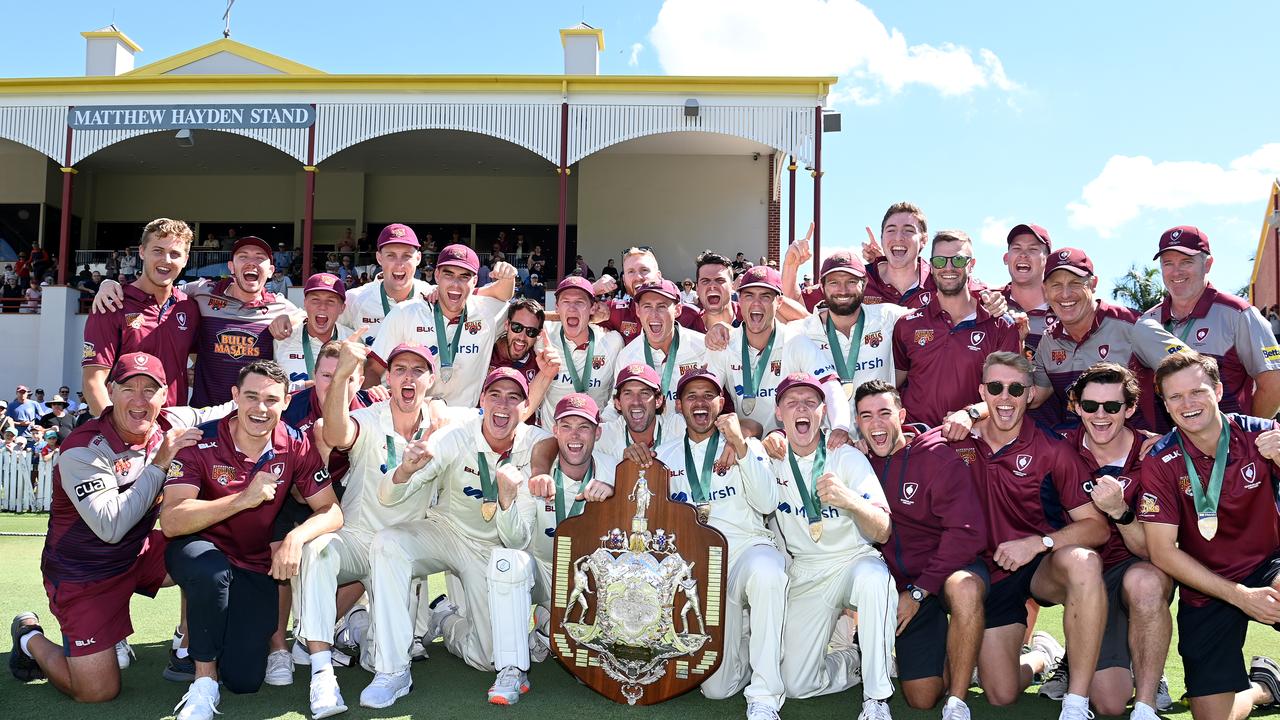 Queensland celebrates the Sheffield Shield victory. Picture: Bradley Kanaris/Getty