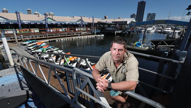 9/4/2018: Adrian Bond, of Jet Ski Safaris, at Mariners Cove Marina, Main Beach, Gold Coast. Adrian, with his jet ski's un-used, is amazed at how quiet his business and others surrounding have been while the Commonwealth Games have been running. Lyndon Mechielsen/The Australian