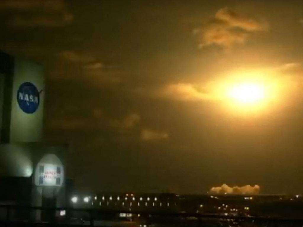 SpaceX is reusing a rocket and crew capsule in a human mission for the first time. Picture: NASA TV / AFP