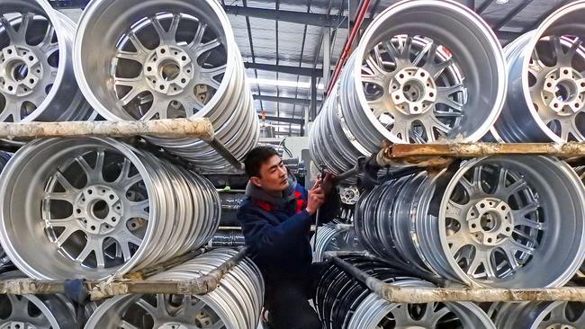 China’s economy expanded in 2021 though slowing grow in the final few months of the year points to challeges ahead. Photo by STR / AFP / China OUT