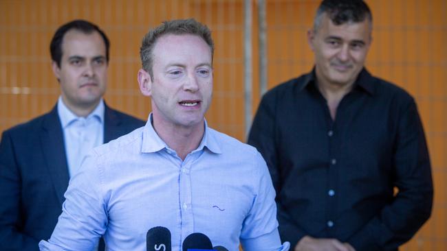 South Australian Leader of the Opposition MP David Speirs and MP Vincent Tarzia with former owner of Safer Places SA on South Road Peter Katarbani at a press conference on South Road. Picture: Emma Brasier