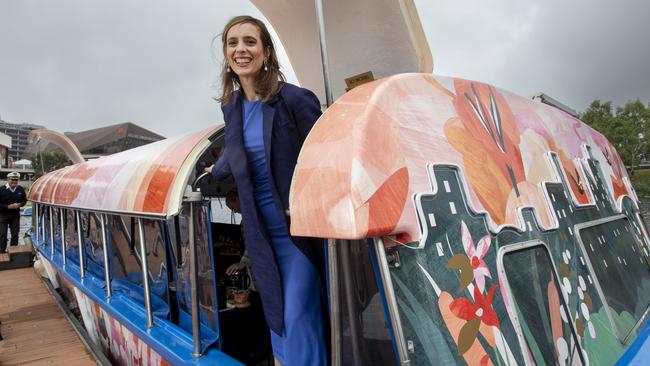 Alice Lindstrom unveils her Ramsay Art Boat design on Popeye at the River Torrens. Picture: Brett Hartwig