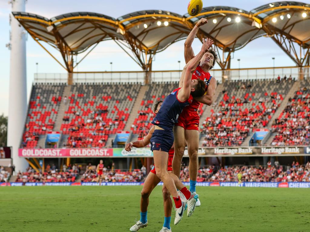 Charlie Ballard (top) and the Suns have shown form in recent weeks. Picture: Russell Freeman/AFL Photos via Getty Images