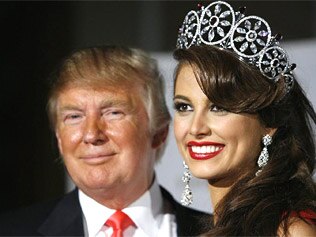 Miss Universe 2009 Stefania Fernandez of Venezuela and organisation owner Donald Trump / Reuters