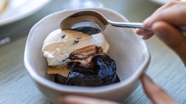 The Baked Valrohna chocolate pudding with rum and raisin ice cream. Picture: Supplied