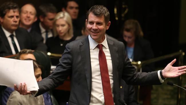 Premier of New South Wales Mike Baird is all smiles after the sale of long-term stake in Ausgrid for around $16.1 billion.