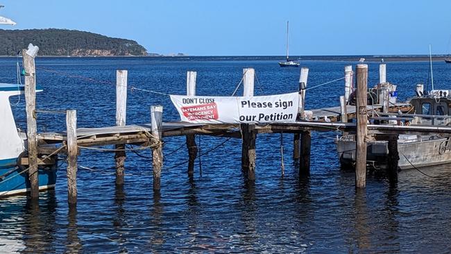 Posters to sign the petition can be seen around Batemans Bay.