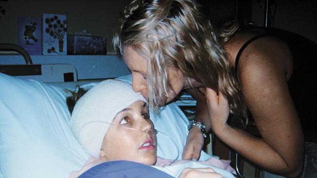 Lauren Huxley with her sister Simone after one of her nine operations.