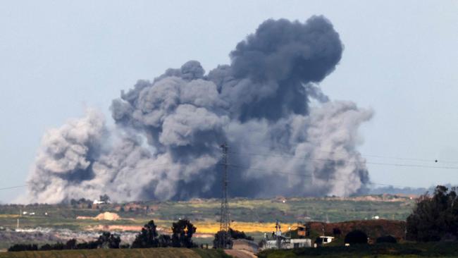 The view from southern Israel as smoke billows over the Gaza Strip during IDF bombardment.