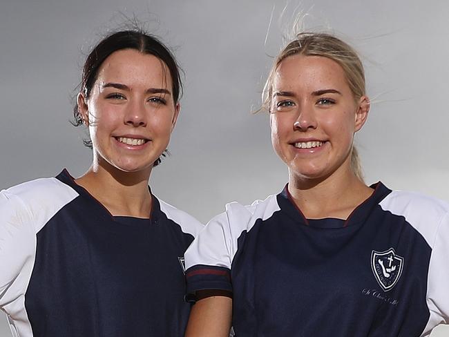 St Clare's College Year 12 students and twin sisters Brianna Edwards and Siobhan Edwards have just won a scholarship to a US college thanks to their star soccer skills. The scholarship which will cover their tuition and living expenses to the University of Louisiana Monroe. (L to R) Brianna and Siobhan pose for a portrait on Maroubra beach, Sydney. Picture: Brett Costello