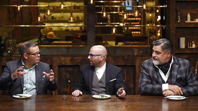 Gary Mehigan, left, George Calombaris and Matt Preston discuss a MasterChef series 11 meal. Picture: Martin Philbey