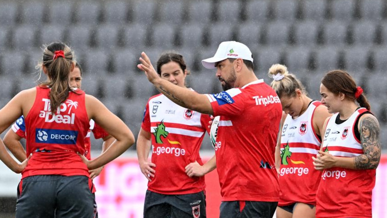 Jamie Soward speaks to Dragons players. Picture: Bradley Kanaris/Getty Images.