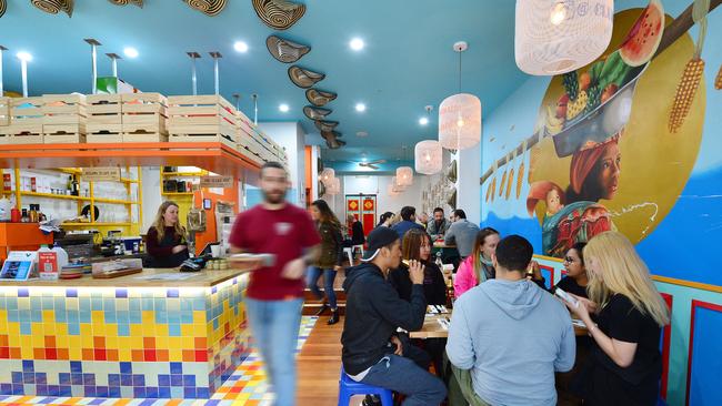 The bright, colourful dining room of Club Colombia. Pictures: Nicki Connolly