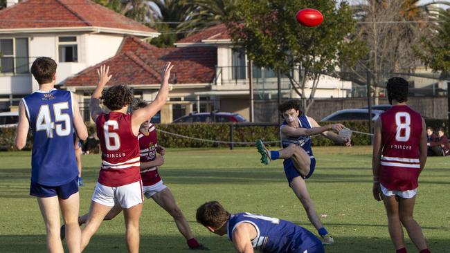 Sacred Heart’s Lewis Rayson kick the ball in the clash against PAC on Saturday. <br/>Picture: Emma Brasier