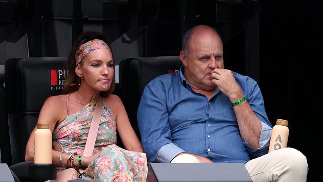 Billy Brownless watches the fourth round singles match between Carlos Alcaraz of Spain Miomir Kecmanovic of Serbia. Photo by Graham Denholm/Getty Images.