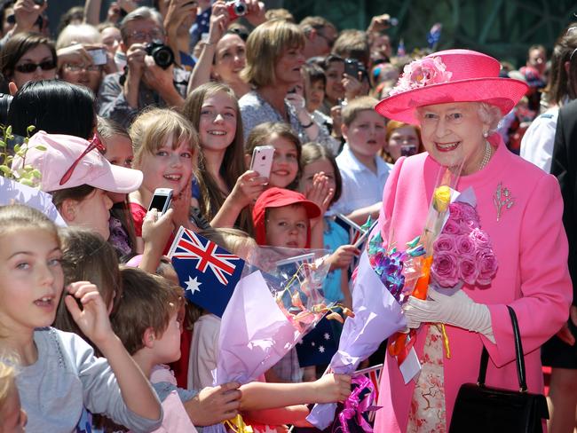 The Queen, right, met children at Melbourne’s Federation Square in 2011.