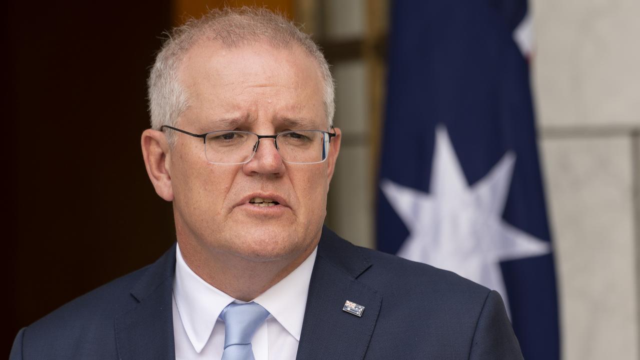 Prime Minister Scott Morrison said leaders had agreed to halve arrivals into NSW, Queensland and WA. Picture: NCA NewsWire / Martin Ollman