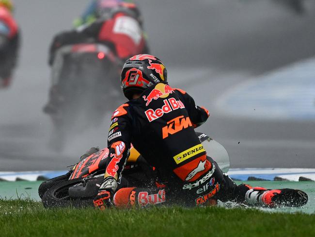 PHILLIP ISLAND, AUSTRALIA - OCTOBER 22: Filippo Farioli of Italy and the Red Bull KTM Tech3 Team crashes in the Moto 3 race during the MotoGP of Australia - Sprint Race at Phillip Island Grand Prix Circuit on October 22, 2023 in Phillip Island, Australia. (Photo by Quinn Rooney/Getty Images)