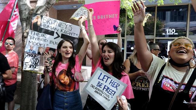 Fans in Los Angeles celebrate the news that Britney Spears’ father, James Spears, has been removed as conservator of her estate. Picture: Kevin Winter/Getty Images/AFP