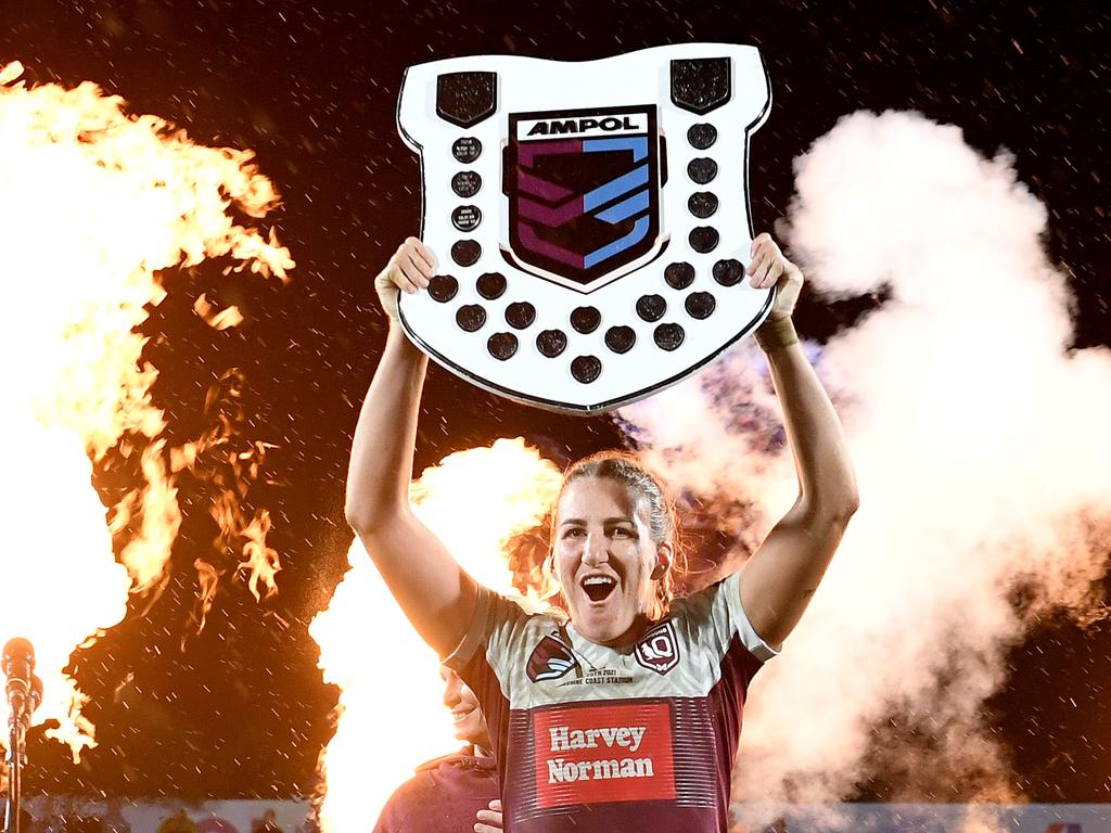 Ali Brigginshaw of Queensland holds up the shield as she celebrates victory after the Women's Rugby League State of Origin match at the Sunshine Coast Stadium on June 25, 2021. Picture: Bradley Kanaris/Getty Images
