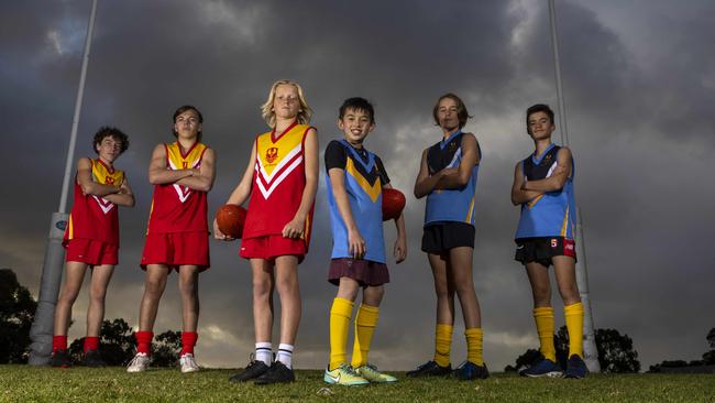 Alec Morfesi, Benjamin Aulert and Archie Ryan of City South with Jude Thomas, Archie Ryan, and Lachie Scott of Southern Heights get set for The Advertiser’s live stream of the Sapsasa metro football carnival. Picture: Kelly Barnes