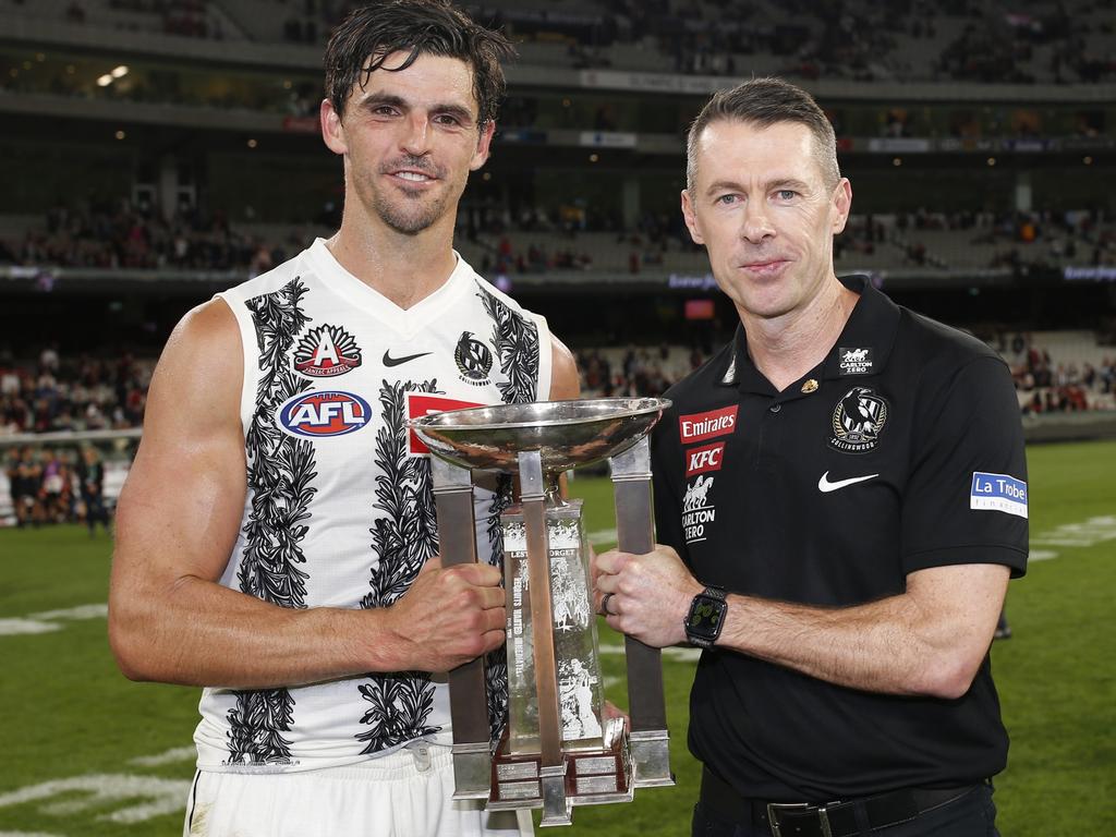Collingwod captain Scott Pendlebury and coach Craig McRae with the Anzac Day Trophy. Picture: AFL Photos/Getty Images