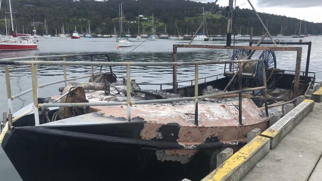 Overnight fire on a boat near Port Arthur that was towed to Kettering. Picture: MATT THOMPSON