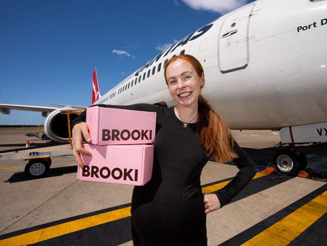 Brooke Bellamy, founder of Brooki Bake House at Brisbane Airport ahead of the opening day of her second store. Supplied by Brisbane Airport