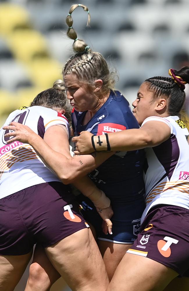 Makenzie Weale of the Cowboys is tackled during the NRLW match between North Queensland Cowboys and Brisbane Broncos. (Photo by Ian Hitchcock/Getty Images)