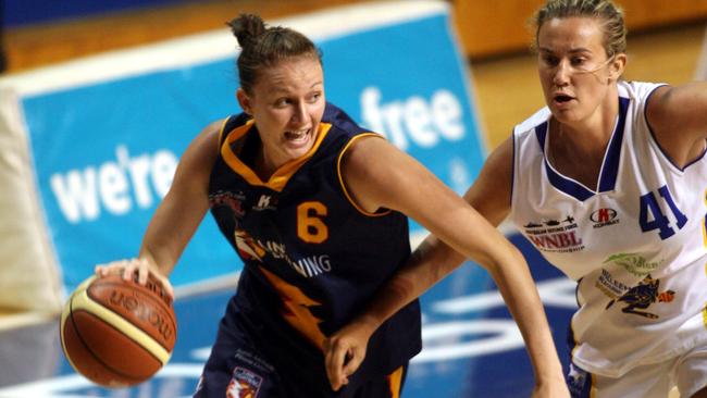 Women's basketball - Adelaide Lightning v Bulleen WNBL match at the Distinctive Homes Dome. Lauren King takes on Anna Crosswhite.