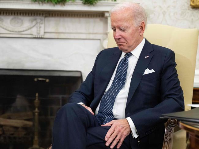 US President Joe Biden listens during a meeting  Israeli President Isaac Herzog in the Oval Office of the White House in Washington, DC, October 26, 2022. (Photo by SAUL LOEB / AFP)