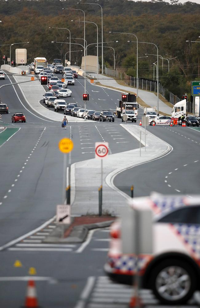 Emergency services pictured at a road incident on the intersection of Wembley Road and Greenfern Drive, Browns Plains. Image: Josh Woning