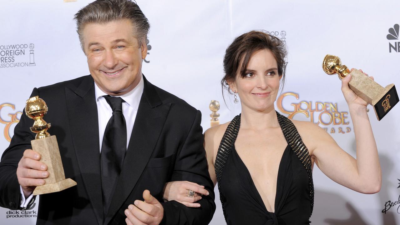 Alec Baldwin (who played Jack Donaghy) and Tina Fey (Liz Lemon) won best actor and actress in a comedy series at the Golden Globes in 2009. Picture: Getty Images.