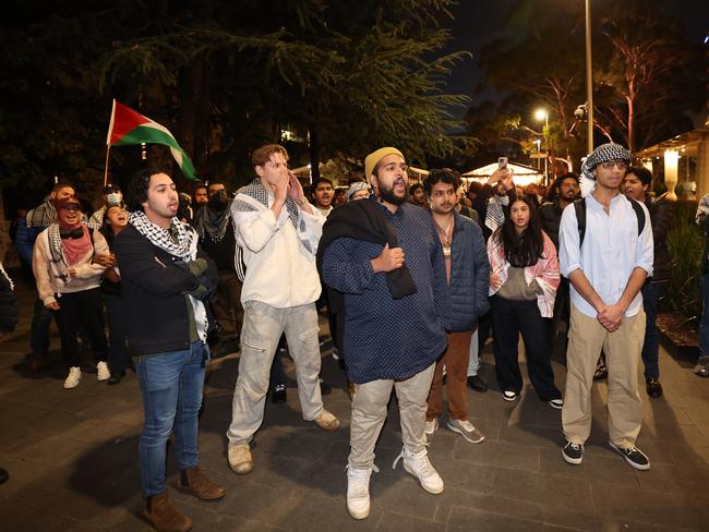 Pro-Palestine protesters prepare to disrupt the event. Picture: David Caird