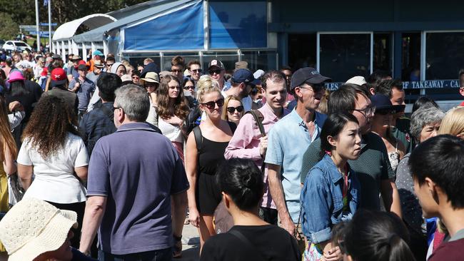 The line for the ferry stretched all the way to the end of the wharf.