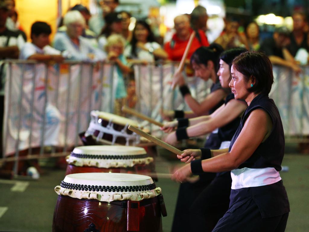 The Cairns Taiko drummers perform for the crowd at the Cairns and District Chinese Association Inc Chinese New Year street festival on Grafton Street. PICTURE: BRENDAN RADKE