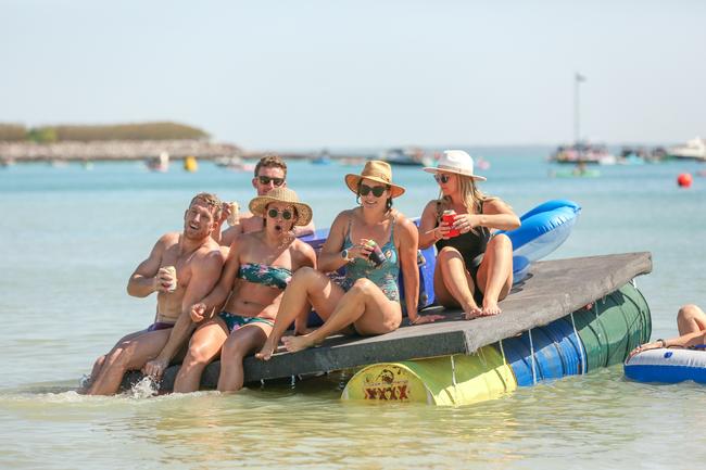 Things getting a little unbalanced at the 2019 Beer Can Regatta at Mindel Beach L to R Heath Mercer, Mitch Roberts , Ash Mercer , Georgia Roberts and Romana Mercer . Pic Glenn Campbell