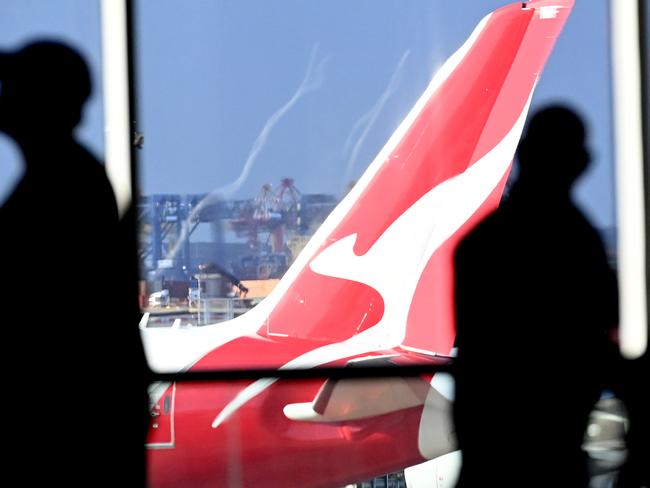 SYDNEY, AUSTRALIA - NewsWire Photos JULY 29, 2022: General scenes of a Qantas plane at the arrival gate at SydneyÃs International AirportPicture: NCA NewsWire / Jeremy Piper