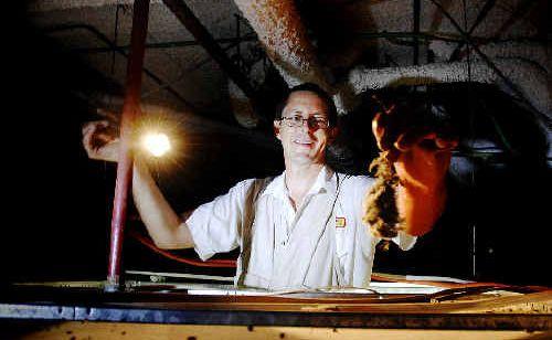 Amalgamated Pest Control technician Ricky Brewer finds a decaying rat carcass in this Goonellabah ceiling cavity. Experts say rats are currently enjoying a ‘population explosion’. . Picture: David Nielsen