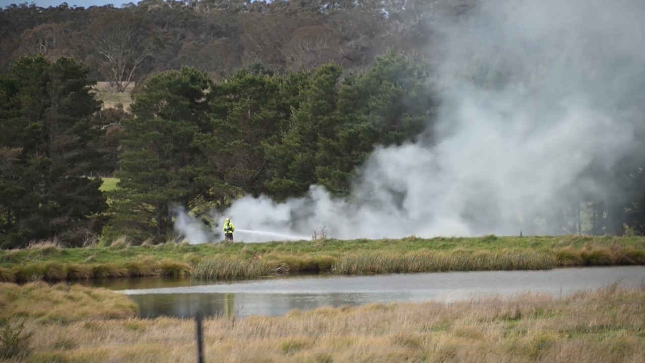 Emergency crews battling the blaze after a fatal plane crash. Picture: Supplied